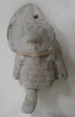 Figur�n de astronauta de la cultura Narr�o 06 en
                  blanco