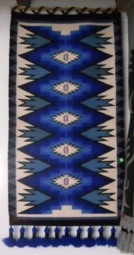Tejido gr�fico con dise�o de rayas en
                            colores celestes