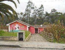 Un centro infantil en Peguche con un
                          pintado chistoso con una vaca