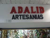 Guayaquil, Promenade 2000,
                        Kunsthandwerk-Laden (01), die �berschrift
                        "Adalid Artesan�as", Stand Nr. C48