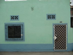 Machala,
                          fachada de una casa