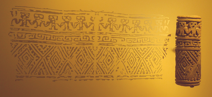 Columbia's
                Tumaco Culture, rolling stamp with extraterrestrials
                with gigantic heads