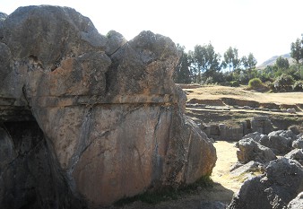 Sacsayhuam�n (Cusco), big quarry, the rock with the stairs and the throne overthrown turned over upside down 01