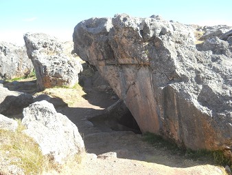 Sacsayhuam�n (Cusco), big quarry, the rock with the stairs and the throne overthrown turned over upside down 02