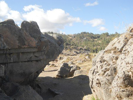 Sacsayhuam�n (Cusco), big quarry, the rock with overthrown stairs turned over upside down 02