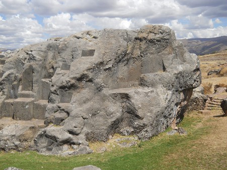 Details from the rock of stairs and thrones "Chinchana grande", view 3-2 with many thrones on the right side