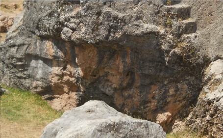 The rock of stairs and thrones "Chinchana grande" (rock of stairs), lateral view - big cuts in the black and red rock