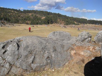 Cusco Sacsayhuam�n 10, chaos area, a flattened giant stone with cuts is half in the earth yet 2