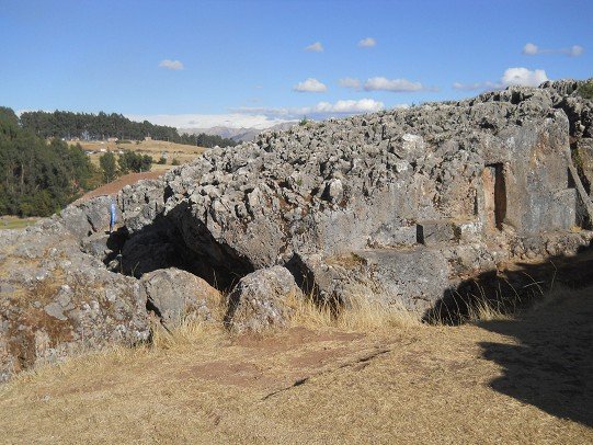 Cusco Sacsayhuam�n, even more mysteries: rock walls of the corridor in black and red with niches and thrones, panorama 03