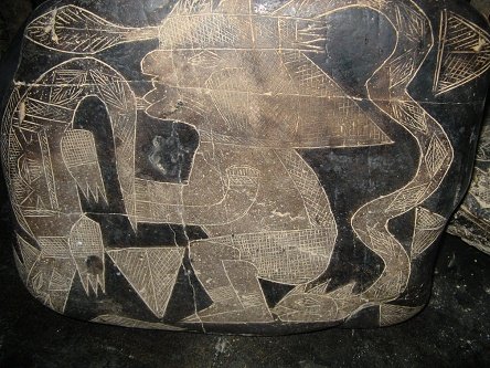 A wise man with a lizard and a snake
                            01
