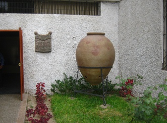 Another memorial board with a great
                          amphora