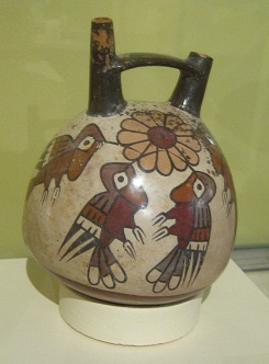 Bottle with hummingbird design,
                                    close-up