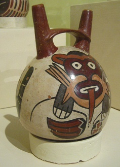 Ceramic bottle with the design
                                    of a monkey, close-up