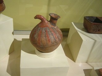 Ceramic bottle of Chincha
                                    culture with graphic designs